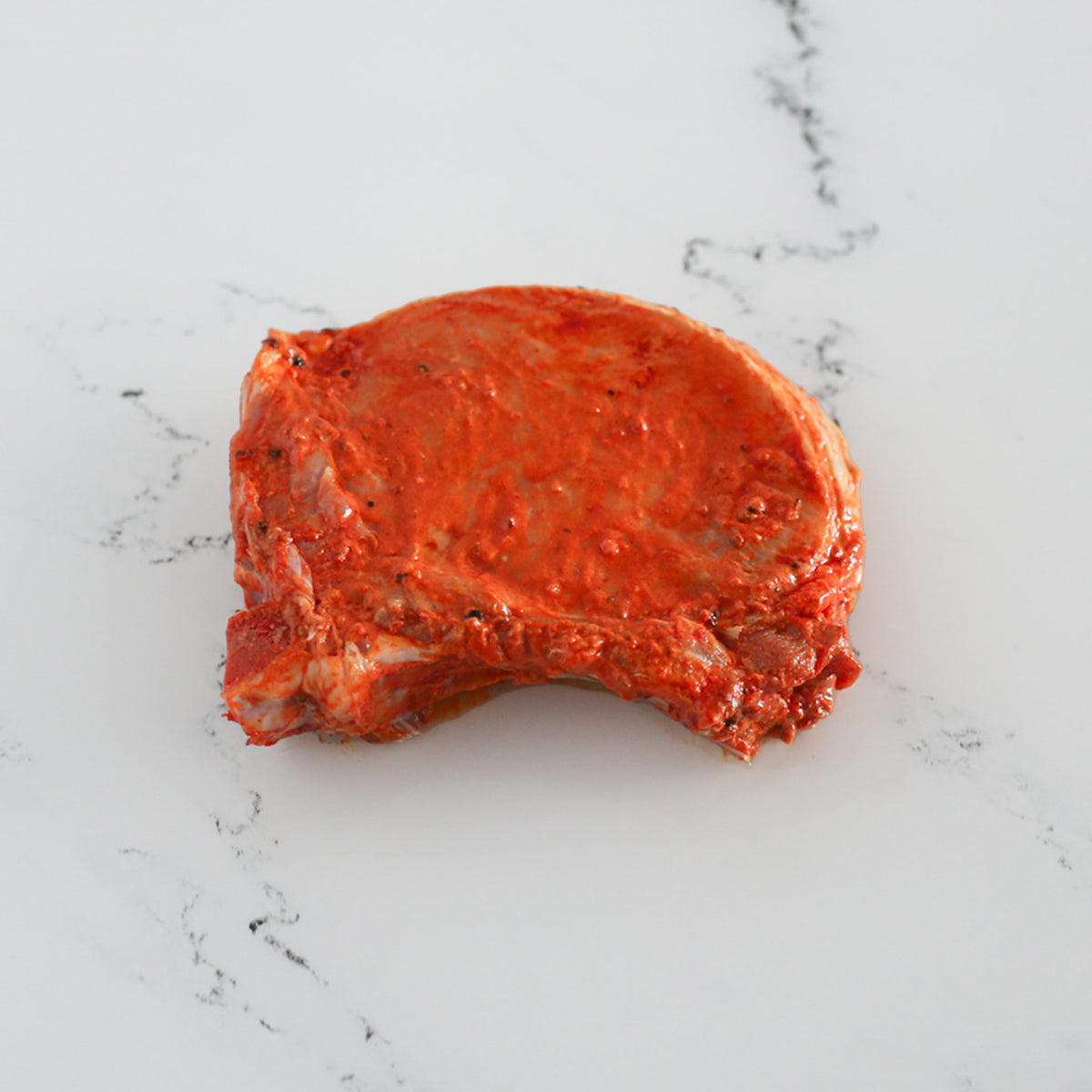 Côtes de porc marinées maison aux 3 poivres - La Boucherie